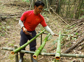 Father Gun making a bamboo table